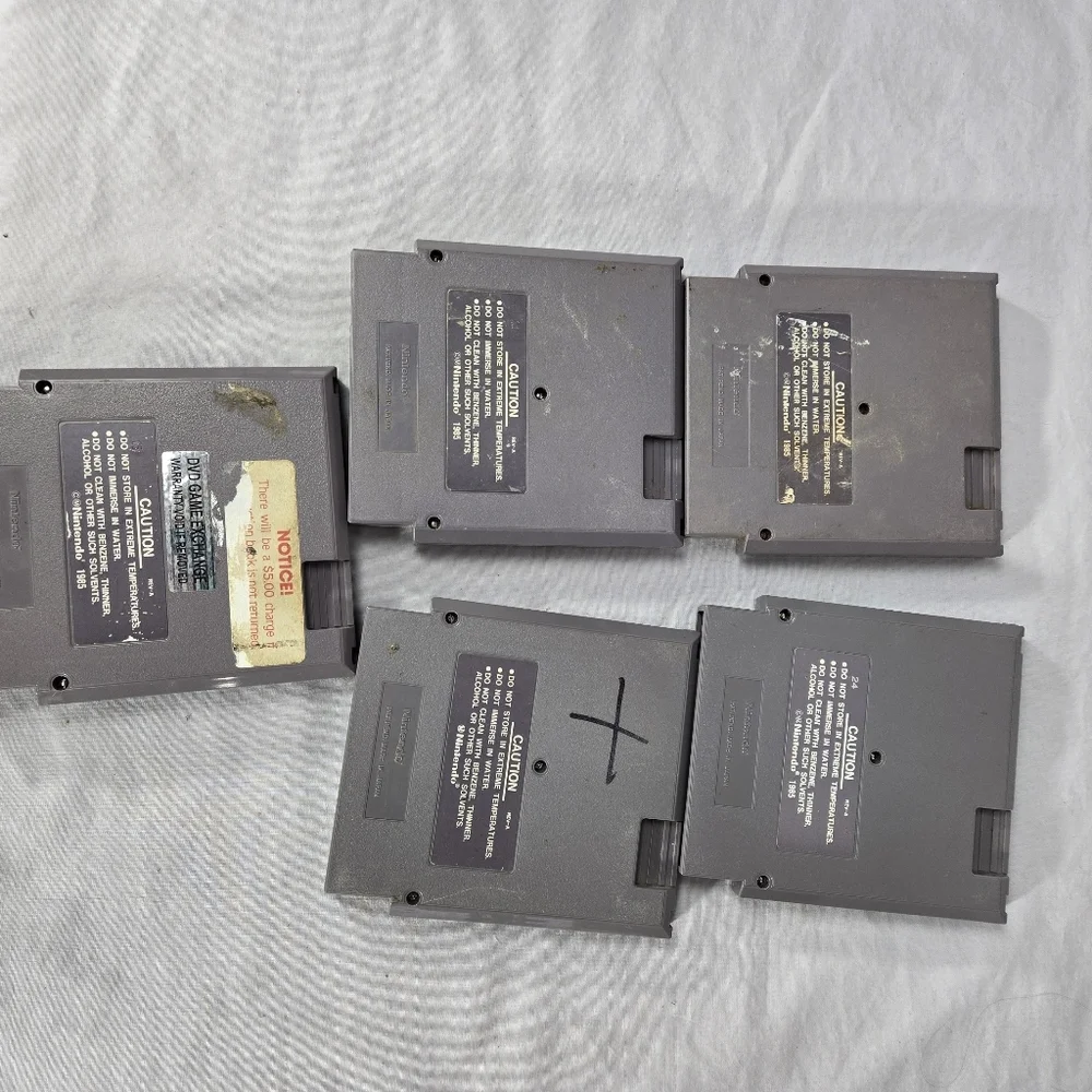 Lot of 5 Nintendo NES Top Gun, Sky Shark, wizardsand Warriors, Bayou Billy, fest